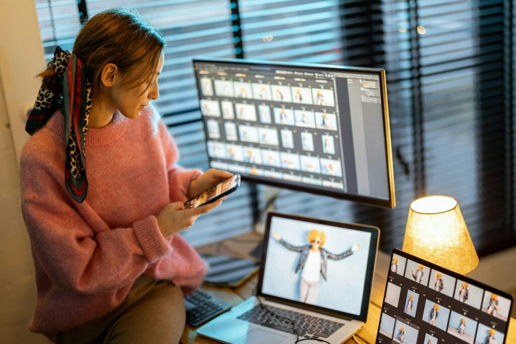 Photographer editing photos at home office